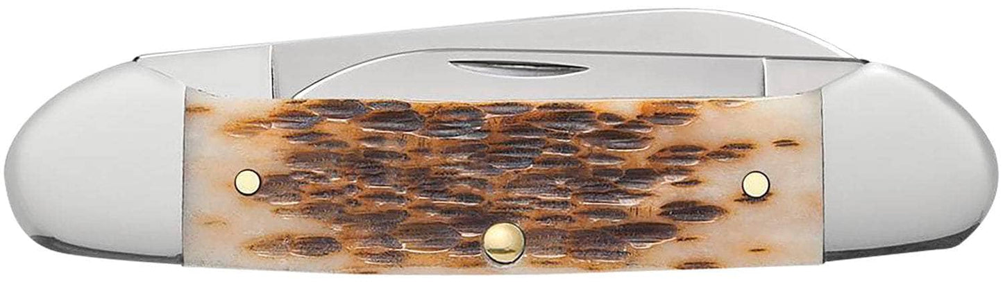 CASE 00263 AMBER BONE PEACH SEED JIG CANOE