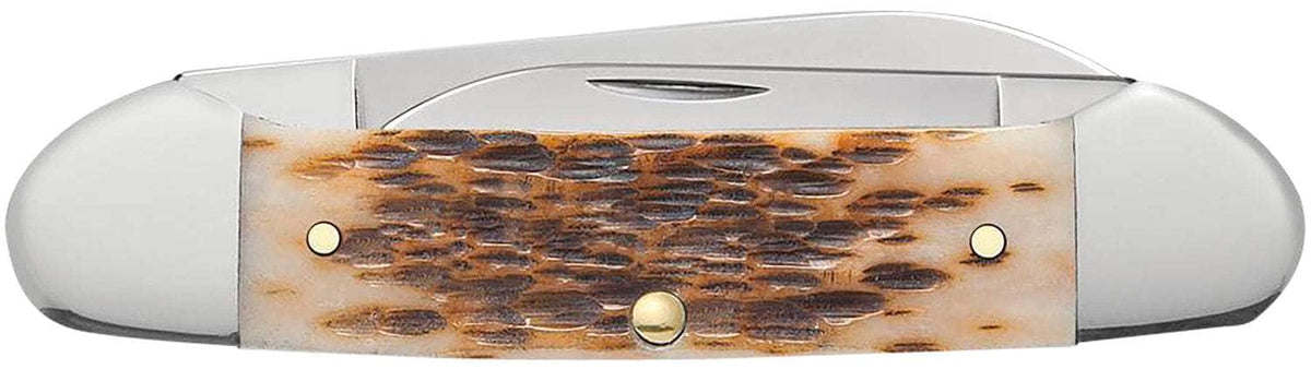CASE 00263 AMBER BONE PEACH SEED JIG CANOE