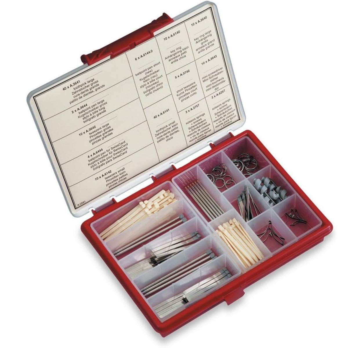Victorinox 4.0581 replacement parts kit open in a red divided case with toothpicks, tweezers, pens, key rings, scissor springs and mini screwdrivers